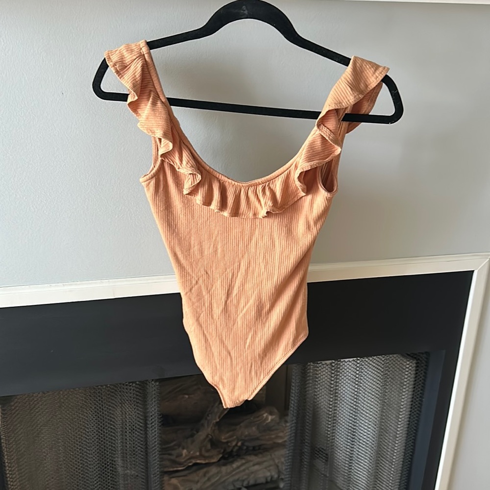 Boutique ruffle tan bodysuit